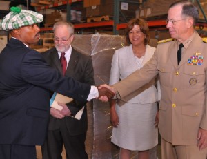 Veteran Derryl Caldwell is welcomed by Navy Adm Mike Mullen, chairman of the Joint Chiefs of Staff